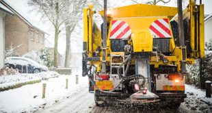 Winter gritting lorry at work